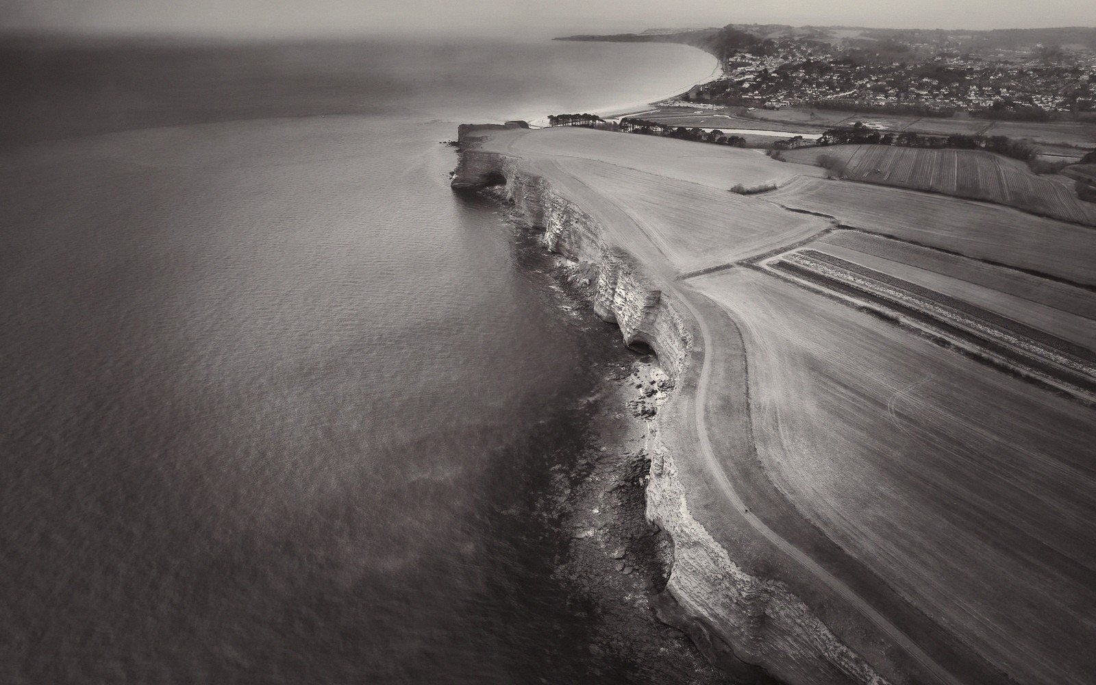 The Coast Path — a red cliff on the South West Coast Path